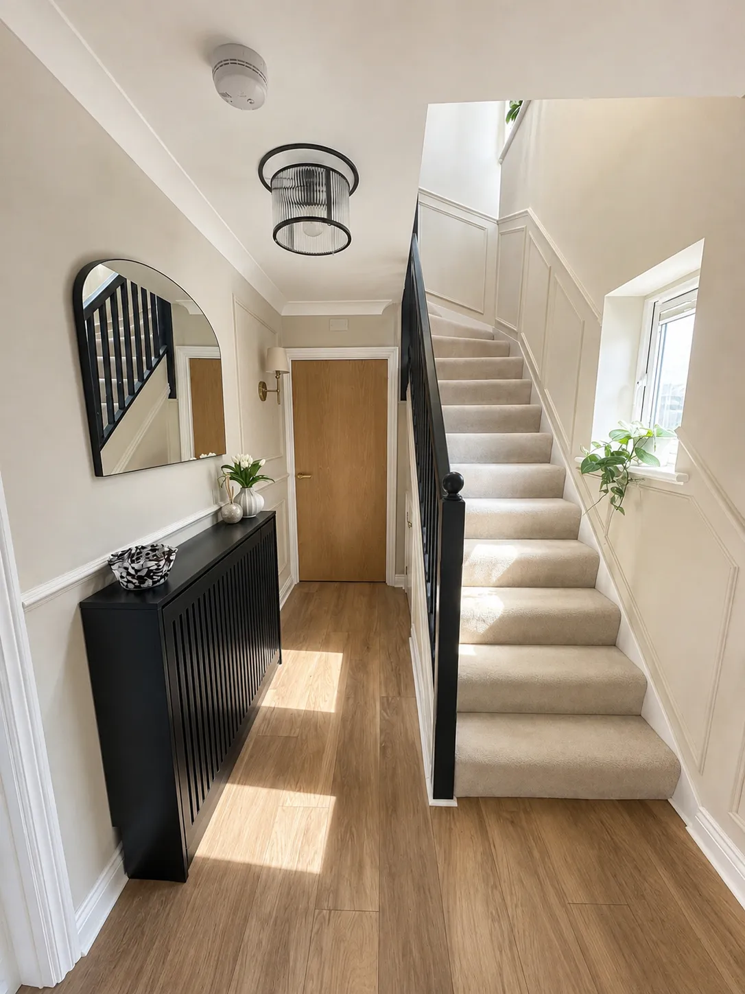 Panelled hallway and staircase in daylight, Bury St Edmunds