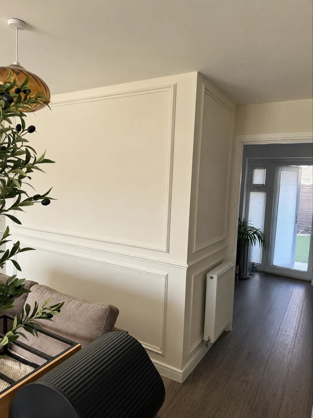 Freshly painted wall panelling in a bright living room, Suffolk